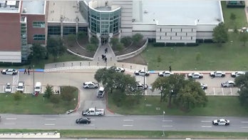 Texas police say two dead in shooting at Dallas County Medical Examiner's Office
