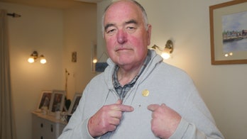 Charity apologizes to chaplain threatened with 'consequences,' 're-training' for wearing cross pin