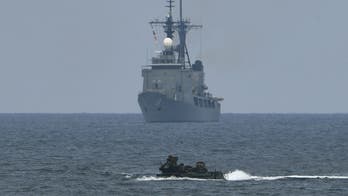 China claims US cruiser 'trespassed' in its waters, Navy calls accusation 'false'