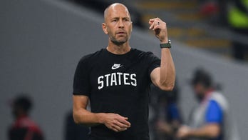 Shirt worn by US soccer coach at World Cup speaks volumes about a nation divided: commentary