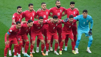 World Cup 2022: Iranian players go silent during national anthem to show support for protesters back home