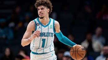 Hornets' LaMelo Ball re-injures ankle after stepping on fan's foot