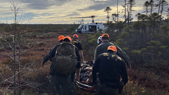 Photo shows dramatic rescue in Maine after man, 74, spent nearly 30 hours lost in woods