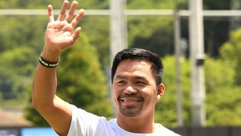 Famed boxing ref admits he 'prolonged the count' in 2000 Manny Pacquiao fight