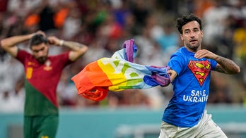 World Cup 2022: Protester holding rainbow flag briefly stops Portugal-Uruguay match