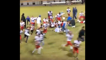 North Carolina football team flees field after gunshots reported, video shows