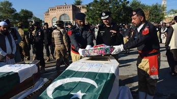 In Pakistan, a string of ambushes by militants leave 6 police, 2 troops dead