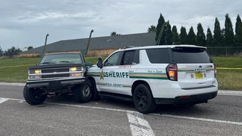 Armed accused arsonist shot by Florida deputies following chase