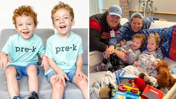 Group hug! Boy gets adorable 'welcome back' at preschool after illness put his twin in the hospital