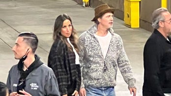 Brad Pitt cozies up to new romantic interest who he's been dating a 'few months': He 'is really into her'