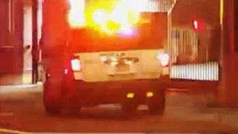 Handcuffed suspect shoots Denver officer while being removed from police vehicle at jail