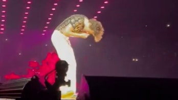 Harry Styles hit in face with flying objects during Los Angeles concert, video shows