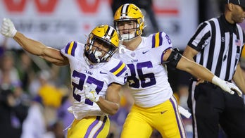 No. 15 LSU beats No. 6 Alabama in OT with two-point conversion