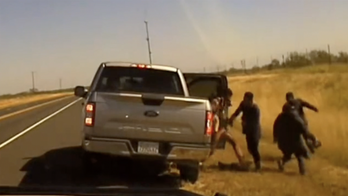 San Antonio woman arrested for human smuggling after ten migrants bail out of pickup truck during traffic stop