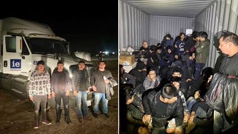 Texas agents uncover 50 illegal immigrants hidden in junkyard big rig, 5 accused human smugglers arrested