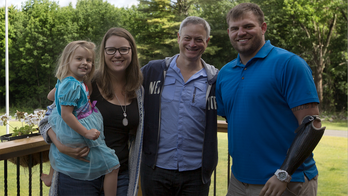 Actor Gary Sinise and quadruple amputee veteran Travis Mills team up to help other wounded service members