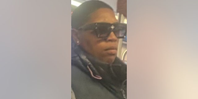 The woman wore black sunglasses.