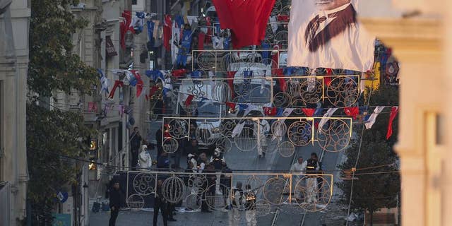 People leave the area after an explosion on Istanbul's popular pedestrian Istiklal Avenue, Sunday, Nov. 13, 2022.