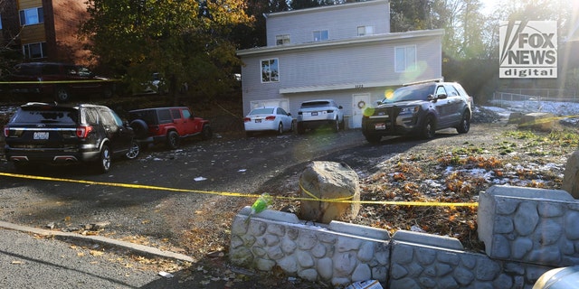 The house at 1122 King Road in Moscow, Idaho, behind police tape on Nov. 15, 2022. Police say four University of Idaho students were stabbed to death inside on Nov. 13.