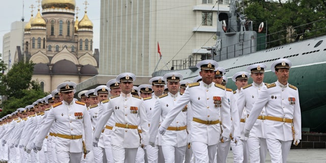 Russian navy officers take part in a graduation ceremony at the Makarov Pacific Higher Naval School in Vladivostok, Russia, on June 18, 2022.