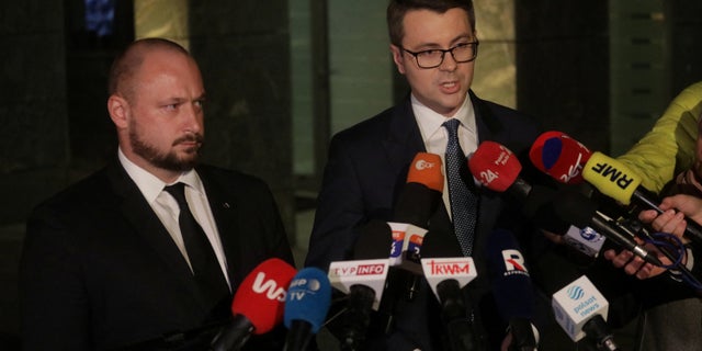 Polish government spokesman Piotr Muller speaks to the media after a meeting in Warsaw of the security committee about the missile attack on the territory of Poland Nov. 15, 2022.