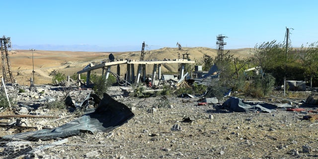 A view shows the aftermath of airstrikes, which Turkey's defense ministry says was carried out in Derik, Syria, Nov. 20, 2022.