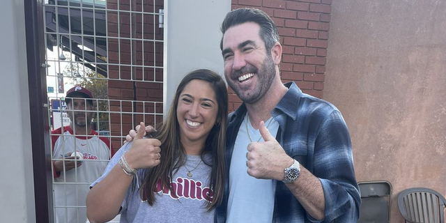 Houston Astros pitcher Justin Verlander does a thumbs up with Phillies fan Stephanie Di Ianni before Game 3 of the World Series in Philadelphia, Pa. 
