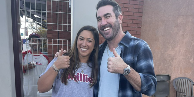 Houston Astros pitcher Justin Verlander does a thumbs up with Phillies fan Stephanie Di Ianni before Game 3 of the World Series in Philadelphia, Pa. 