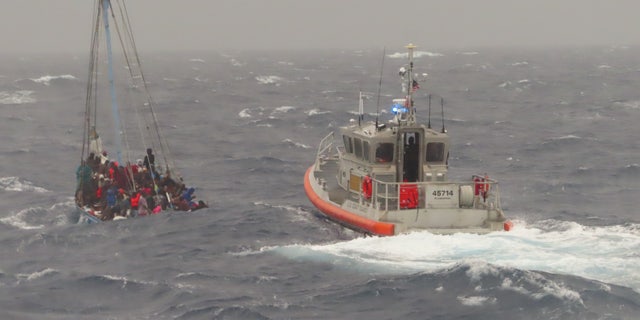 It took several hours for the Coast Guard to rescue 22 migrants from the overloaded ship near the Florida Keys. 