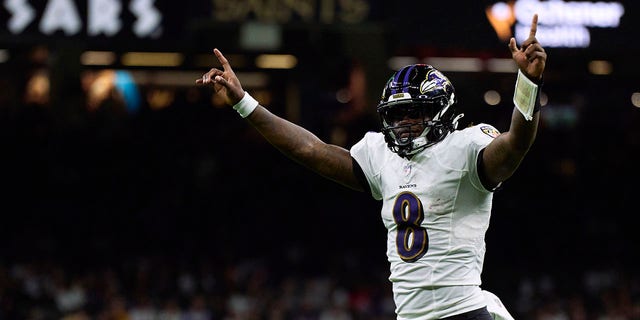 Lamar Jackson #8 of the Baltimore Ravens celebrates after a touchdown against the New Orleans Saints during the second half of the game at Caesars Superdome on November 7, 2022 in New Orleans, Louisiana.
