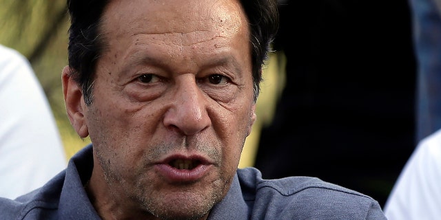 Former Pakistani Prime Minister Imran Khan speaks at a press conference in Islamabad on April 23, 2022. Pakistani officials said on Thursday, November 3, 2022, that a gunman opened fire on a container truck carrying Khan, injuring him slightly and also some of his supporters.