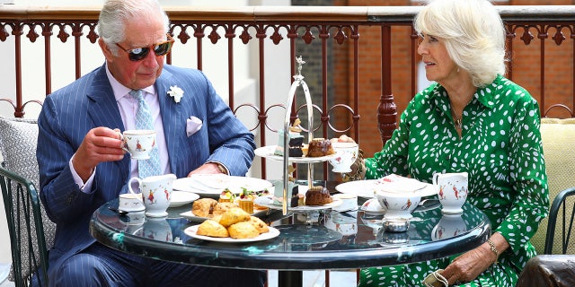 Christopher Andersen claimed King Charles, seen here having tea with his wife, Queen Consort Camilla, travels with his personal chef.