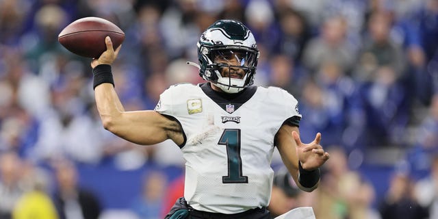 Jalen Hurts, of the Philadelphia Eagles, attempts a pass against the Colts at Lucas Oil Stadium on Nov. 20, 2022, in Indianapolis.