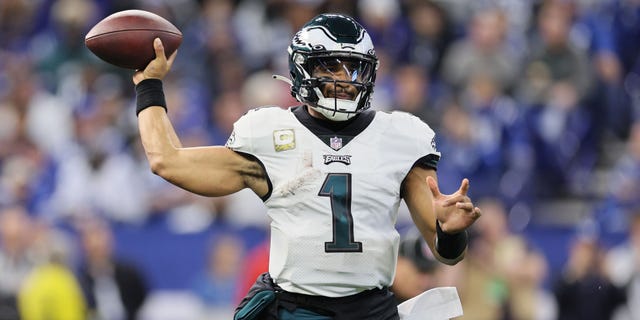 Jalen Hurts, of the Philadelphia Eagles, attempts a pass against the Colts at Lucas Oil Stadium on Nov. 20, 2022, in Indianapolis.