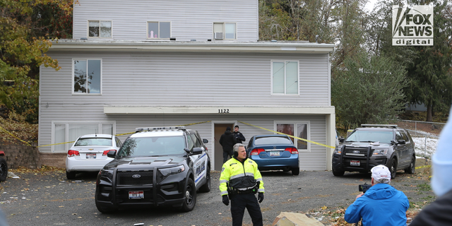 Police search a home in Moscow, Idaho on Monday, November 14, 2022, where four University of Idaho students were killed over the weekend in an apparent quadruple homicide. 