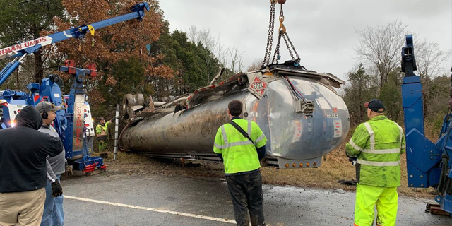 An empty truck was sent to the scene to off-load the fuel while emergency crews cleaned up gas that leaked onto the roadway.