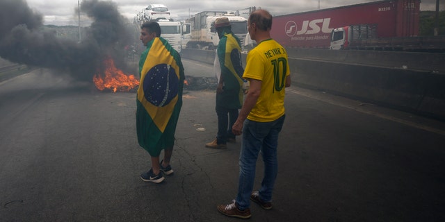 Truckers blocking a highway to protest the election run-off between their candidate Jair Bolsonaro who lost to former President Luiz Inacio Lula da Silva. Sao Paulo, Brazil, Tuesday, Nov. 1, 2022.