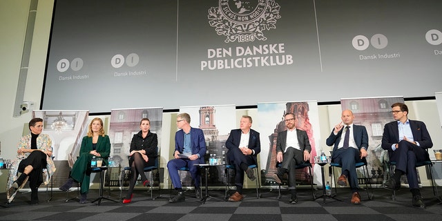 Participants including Denmark's Prime Minister and head of the Social Democratic Party Mette Frederiksen, third from left, attend the traditional post-election debates in Copenhagen, Denmark, Wednesday, Nov. 2, 2022. Voters in Greenland secured the last two seats necessary for the center-left bloc of Prime Minister Mette Frederiksen to win Denmark's general election.