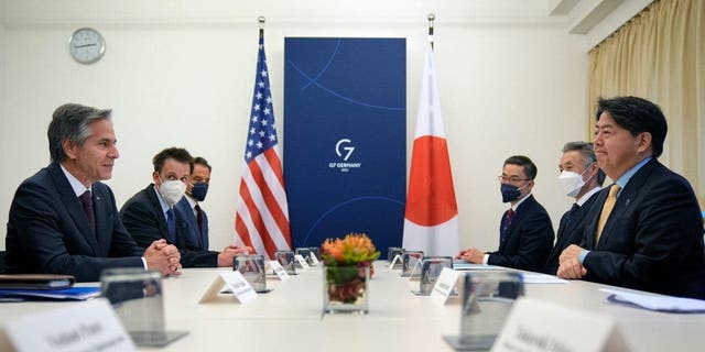 United States Secretary of State Antony Blinken and Japanese Foreign Minister Yoshimasa Hayashi, right, meet for bilateral talks at the G7 Foreign Ministers' Meeting in Muenster, Germany on Friday, November 4, 2022. 