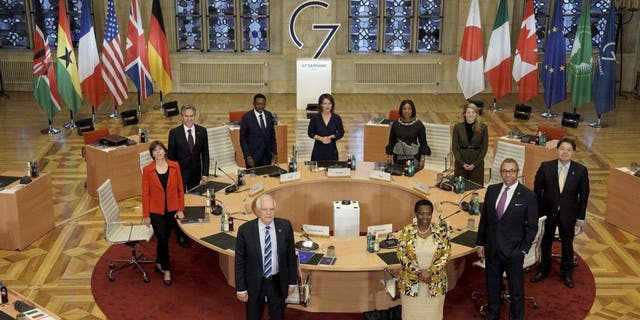 Clockwise from left, Foreign Minister of France Catherine Colonna, Secretary of State of the United States Antony Blinken, Foreign Minister of the Republic of Ghana Alfred Mutua, German Foreign Minister Annalena Baerbock, Foreign Minister of the Republic of Ghana Shirley Ayorkor Botchwey, Canadian Foreign Minister Mélanie Joly, Japan's Foreign Minister Yoshimasa Hayashi, Foreign Minister of Great Britain James Cleverly, Vice Chair of the African Union Commission Monique Nsanzabaganwa and the EU Representative for Foreign Affairs Josep Borrell pose for a photo at the Historic Town Hall during the G7 Foreign Ministers Meeting in Muenster, Germany, Friday, Nov. 4, 2022. 