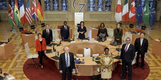 Clockwise from left, Foreign Minister of France Catherine Colonna, Secretary of State of the United States Antony Blinken, Foreign Minister of the Republic of Ghana Alfred Mutua, German Foreign Minister Annalena Baerbock, Foreign Minister of the Republic of Ghana Shirley Ayorkor Botchwey, Canadian Foreign Minister Mélanie Joly, Japan's Foreign Minister Yoshimasa Hayashi, Foreign Minister of Great Britain James Cleverly, Vice Chair of the African Union Commission Monique Nsanzabaganwa and the EU Representative for Foreign Affairs Josep Borrell pose for a photo at the Historic Town Hall during the G7 Foreign Ministers Meeting in Muenster, Germany, Friday, Nov. 4, 2022. 