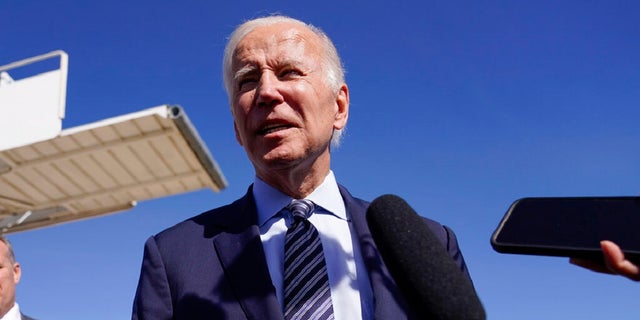 President Joe Biden speaks to journalists before boarding Air Force One at Marine Corps Air Station Miramar on Friday. He remains optimistic about the chance of Democrats taking control of both chambers of Congress.