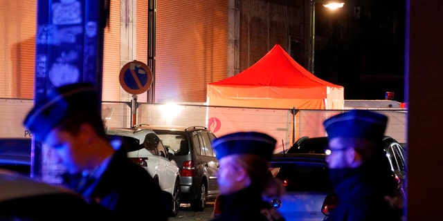 Police attend the scene of an incident in Brussels, Thursday Nov. 10, 2022. One police officer is dead and another injured in a stabbing attack in Brussels, which a <a href=