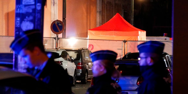 Police attend the scene of an incident in Brussels, Thursday Nov. 10, 2022. One police officer is dead and another injured in a stabbing attack in Brussels, which a <a href=