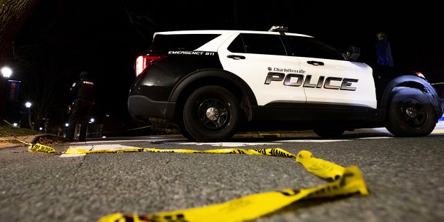 A Charlottesville Police vehicle is parked on Culbreath Road during an active shooter situation on the University of Virginia campus in Charlottesville, Va., on Monday, Nov. 14, 2022. 