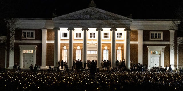 University of Virginia students participate in a vigil in response to an on-campus shooting in Charlottesville, Va., Monday, Nov. 14, 2022. 