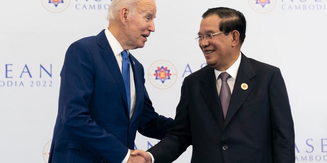 President Biden shakes hands with Cambodian Prime Minister Hun Sen ahead of their meeting at the Association of Southeast Asian Nations Summit on Saturday, November 12, 2022 in Phnom Penh, Cambodia.