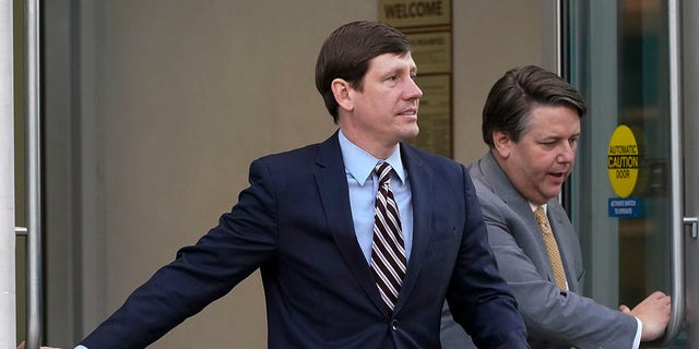 Former Republican state Sen. Brian Kelsey, left, leaves federal court Tuesday, Nov. 22, 2022, in Nashville, Tenn. 