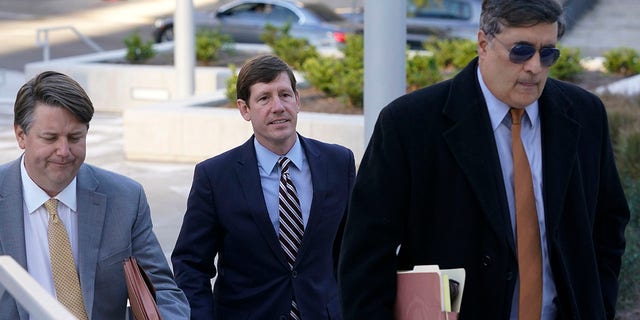 Former Republican state Sen. Brian Kelsey, center, arrives with legal team at federal court Tuesday, Nov. 22, 2022, in Nashville, Tenn. 