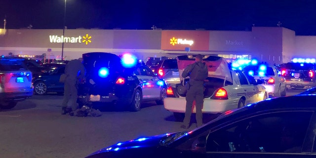 In this video still, police respond to the scene of a fatal shooting at Walmart Tuesday evening, Nov. 22, 2022, in Chesapeake, Virginia.